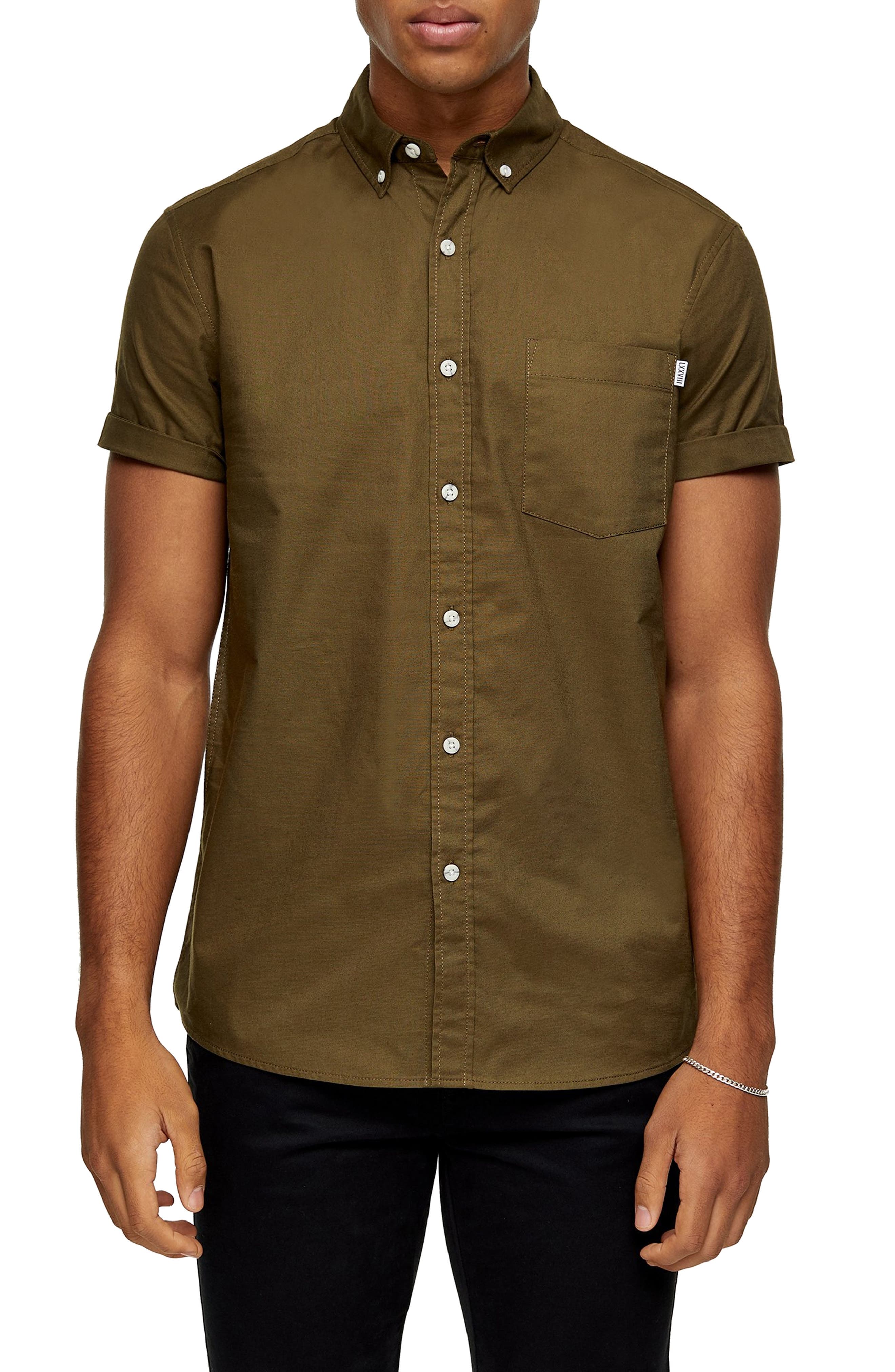 button down shirt and khaki shorts