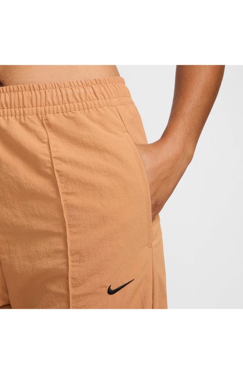 Shop Nike Wide Leg Pants In Flax/black