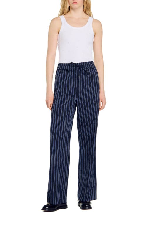 Shop Sandro Striped Trousers In Blue