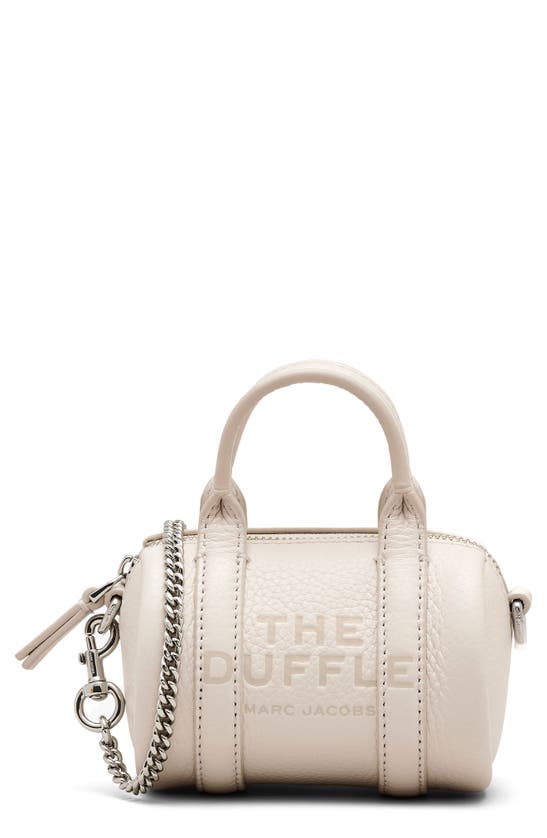Shop Marc Jacobs The Nano Duffle Leather Crossbody Bag In Cotton/ Silver