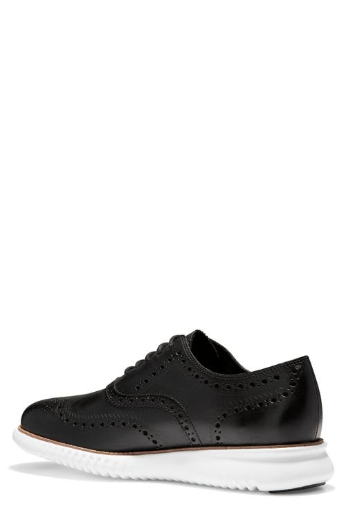 Shop Cole Haan 2.zerogrand Wingtip Oxford In Black Leather/optic White