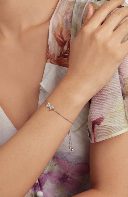 Shop Ted Baker London Barset Pavé Crystal Bow Slider Bracelet In Silver Tone/clear Crystal