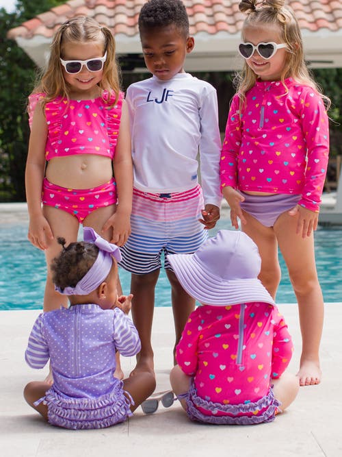 Rufflebutts Baby Girls Long Sleeve Upf50+ One Piece Rash Guard In Colorful Hearts