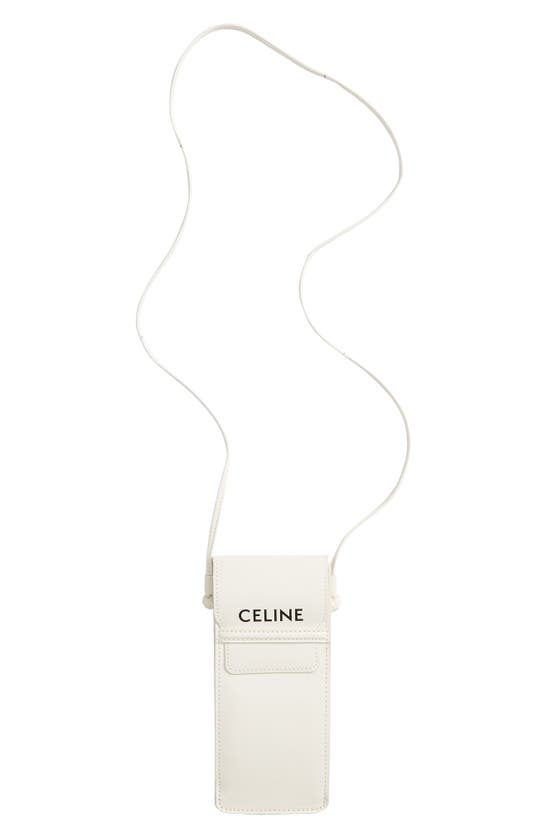 Shop Celine Monochroms 57mm Rectangular Sunglasses In Ivory / Smoke