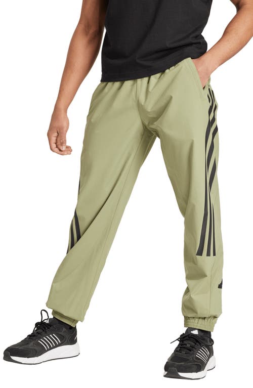 ADIDAS SPORTSWEAR Future Icons 3-Stripes Woven Pants in Tent Green 