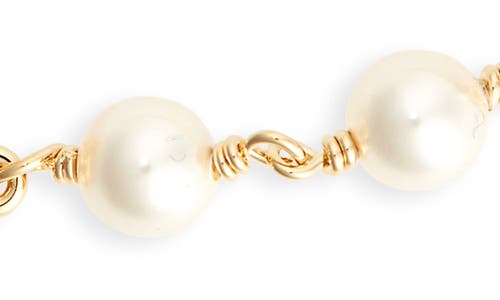 Shop Valentino Garavani Vlogo Signature Imitation Pearl Bracelet In 23r Oro 18/cream Rose