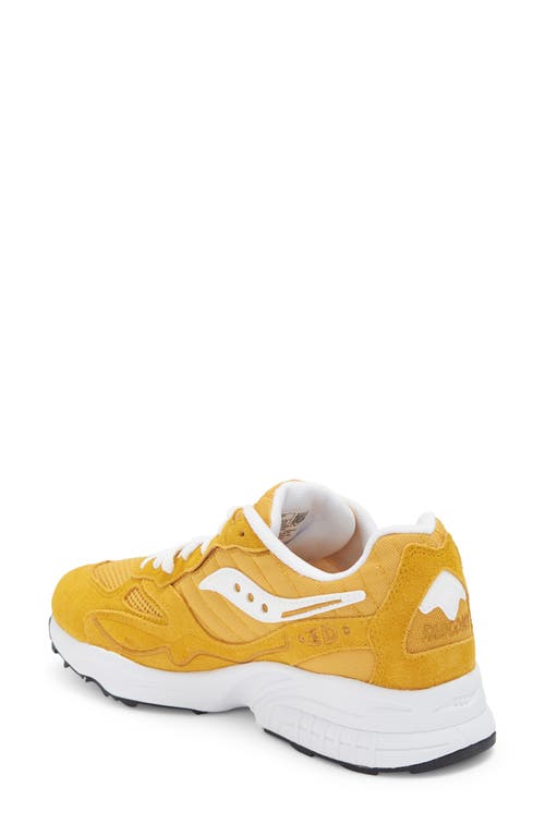 Shop Saucony 3d Grid Hurricane Sneaker In Mustard/white