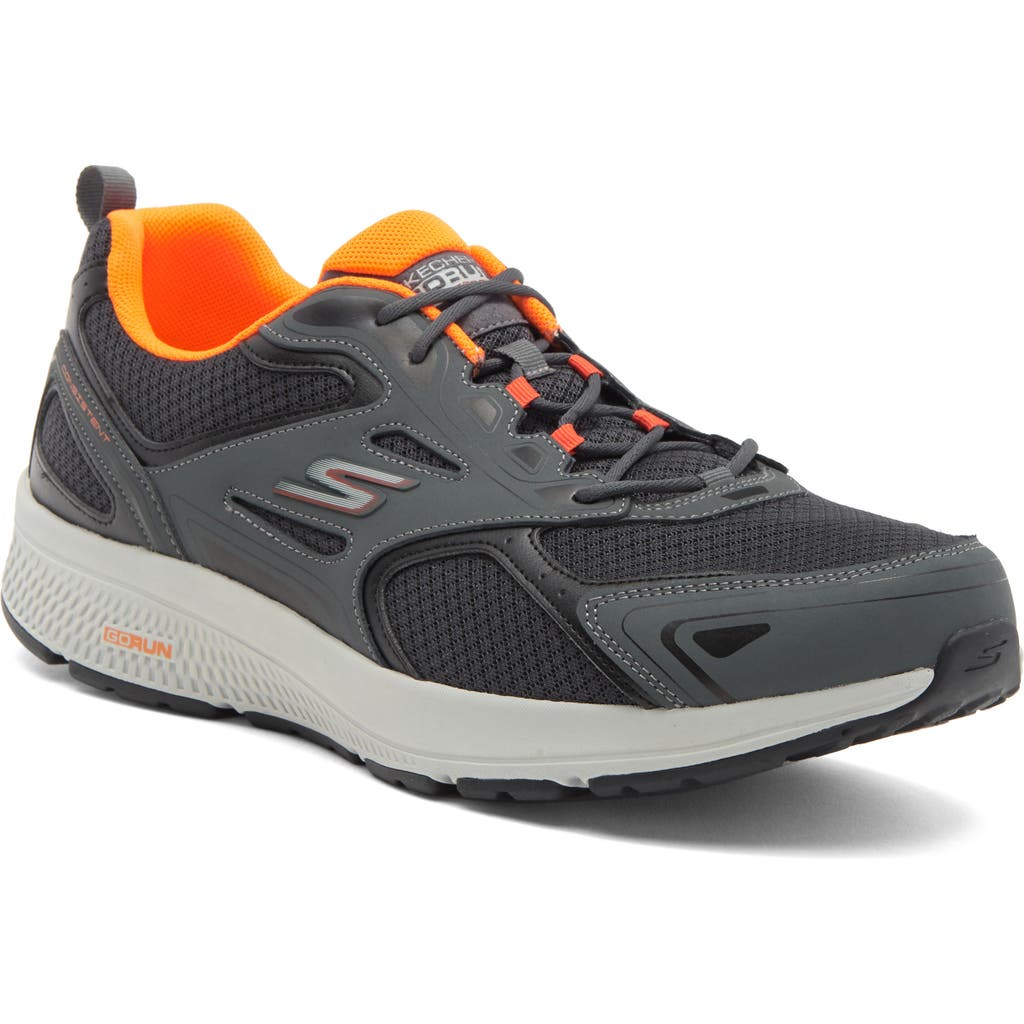 Shop Skechers Gorun Consistent Sneaker In Gray/orange