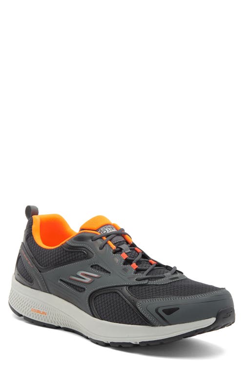 Shop Skechers Gorun Consistent Sneaker In Gray/orange