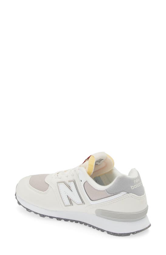 Shop New Balance Kids' 574 Sneaker In Sea Salt/ White