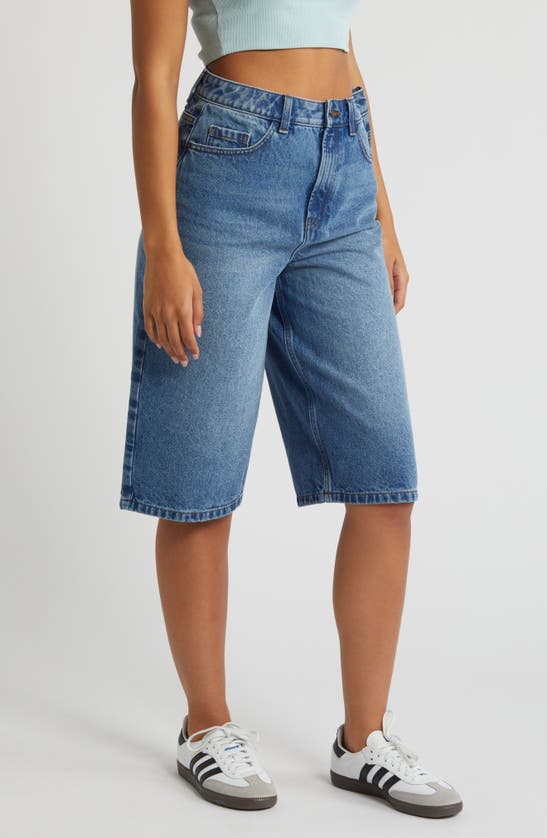 Shop Noisy May Lila High Waist Loose Knee Length Denim Shorts In Medium Blue Denim