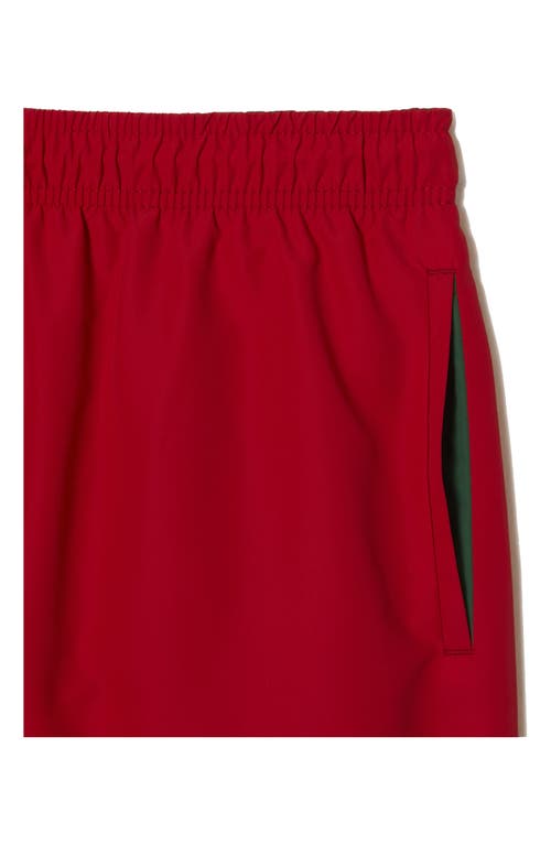 Shop Lacoste Recycled Polyester Swim Trunks In 8un Rouge/vert