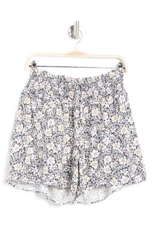 Shop Laundry By Shelli Segal Floral Smocked Waist Flared Shorts In Beige/pink Floral