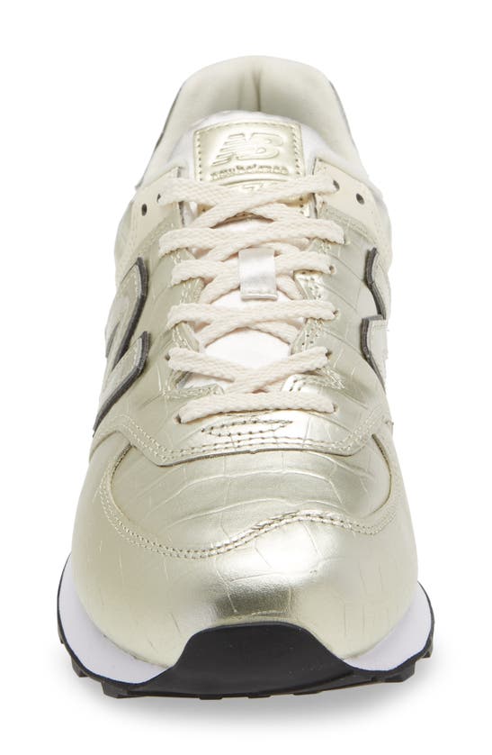 New Balance 574 Sneaker In Gold