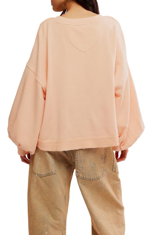 Shop Free People Trish Balloon Sleeve Sweatshirt In Summer Peach