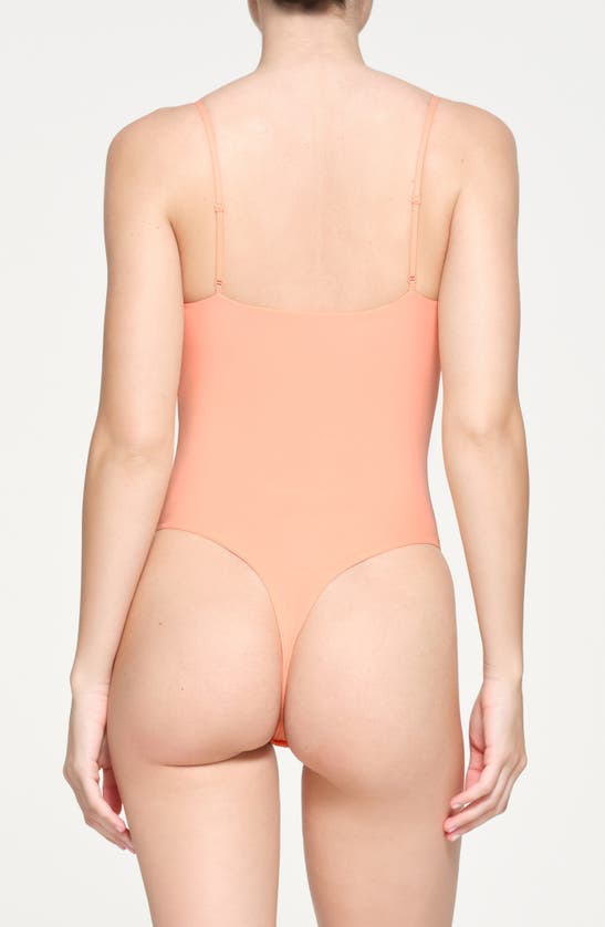Shop Skims Fits Everybody Cami Thong Bodysuit In Faded Nectar