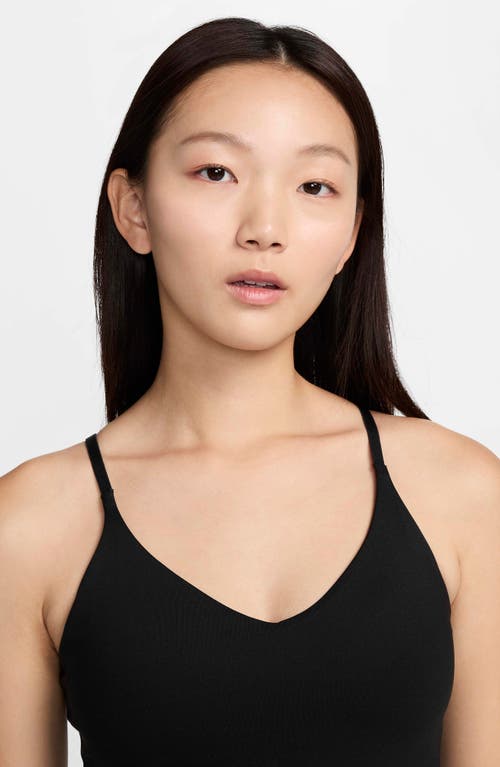 Shop Nike Dri-fit Light Support Sports Bra In Black/white