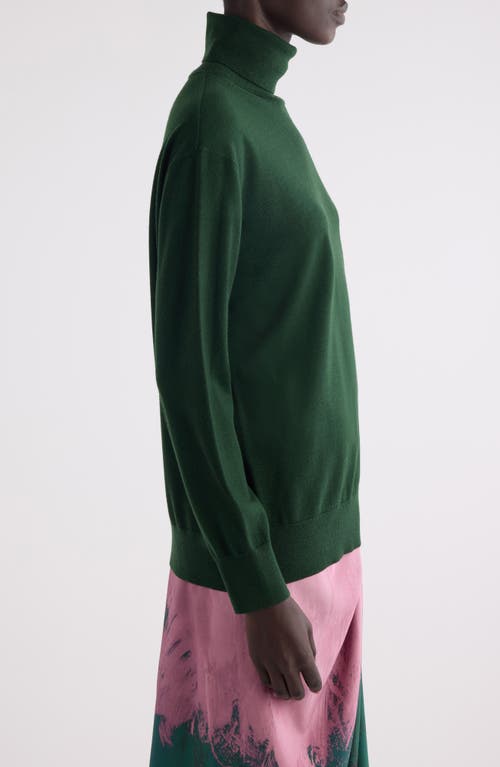 Shop Dries Van Noten Tunnes Merino Wool Turtleneck Sweater In Emerald