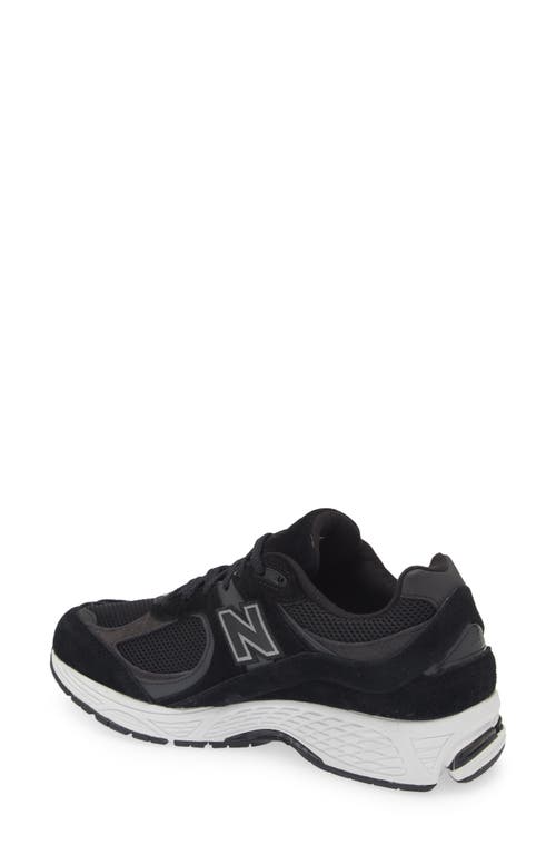 Shop New Balance 2002r Sneaker In Black/gunmetal/white