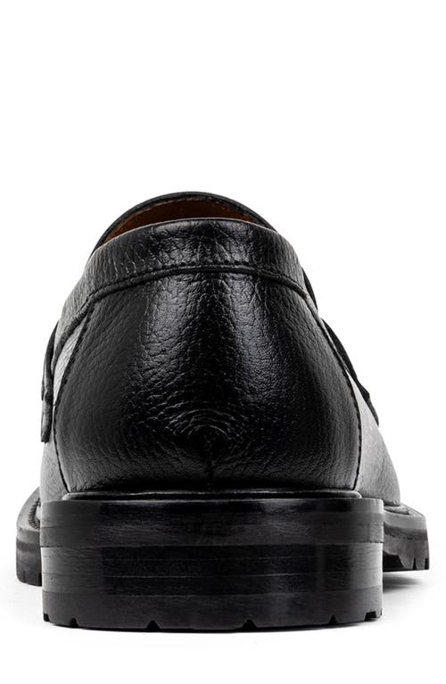 Shop Donald Pliner Lug Penny Loafer In Black