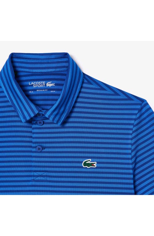 Shop Lacoste Ultradry Stripe Performance Golf Polo In Capitaine/ladigue