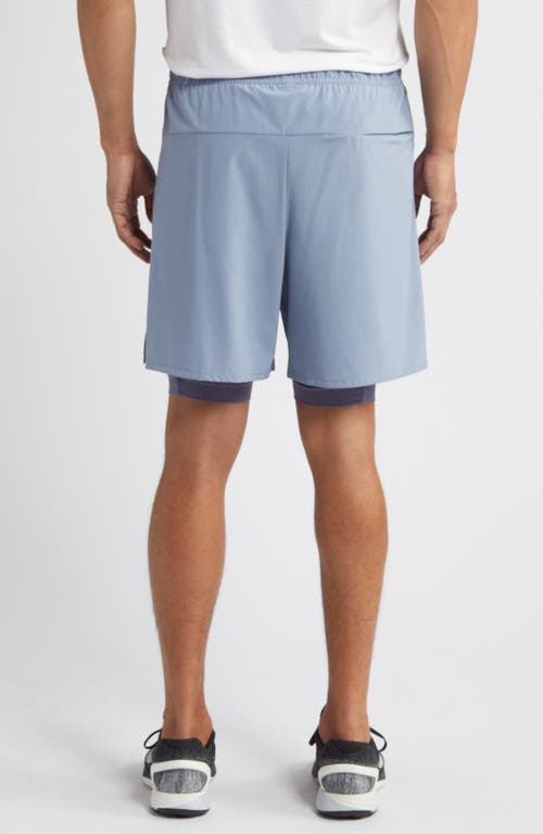 Shop Nike Dri-fit Unlimited 2-in-1 Versatile Shorts In Ashen Slate/light Carbon