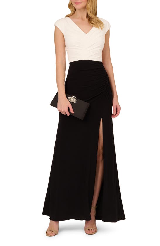 Shop Adrianna Papell Pleated Cap Sleeve Gown In Black/ Ivory