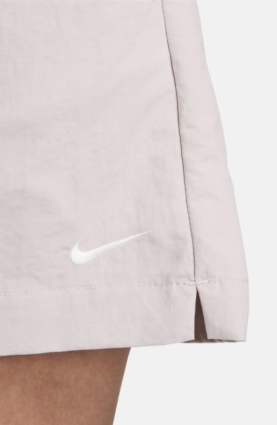 Shop Nike Sportswear Everything Wovens Water Repellent Mid Rise 5-inch Shorts In Platinum Violet/ Sail
