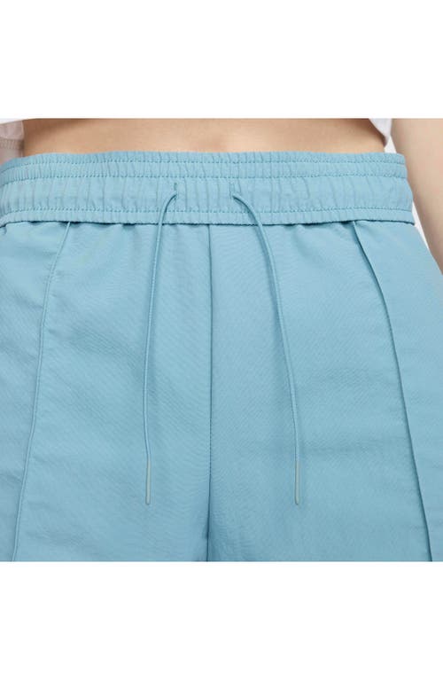 Shop Nike Wide Leg Pants In Denim Turquoise/sail