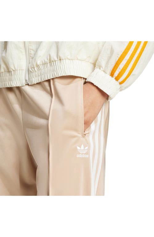 Shop Adidas Originals Adidas Adicolor Firebird Recycled Polyester Track Pants In Magic Beige