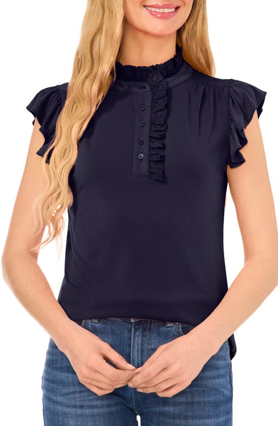 Cece Eyelet Ruffle Detail Crepe Knit Top In Navy Blue Jay