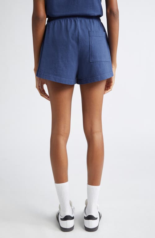 Shop Sporty And Rich Sporty & Rich Eden Crest Cotton Disco Shorts In Indigo