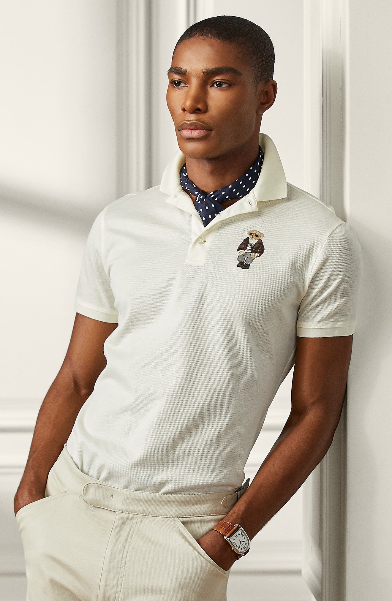 white polo shirt with green horse