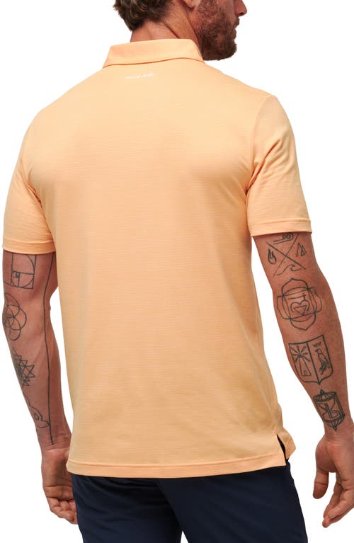 Travismathew The Heater Solid Short Sleeve Performance Polo In Apricot