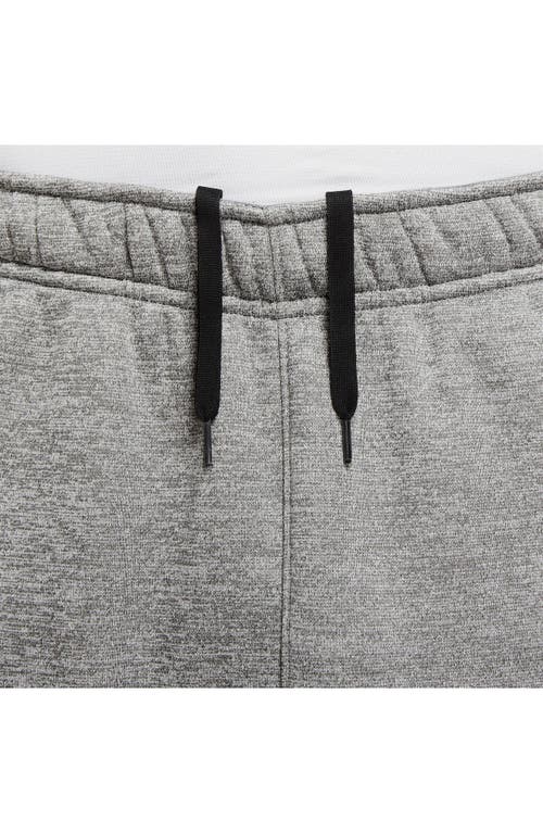 Shop Nike Therma-fit Tapered Training Pants In Dk Grey/particle Grey/black