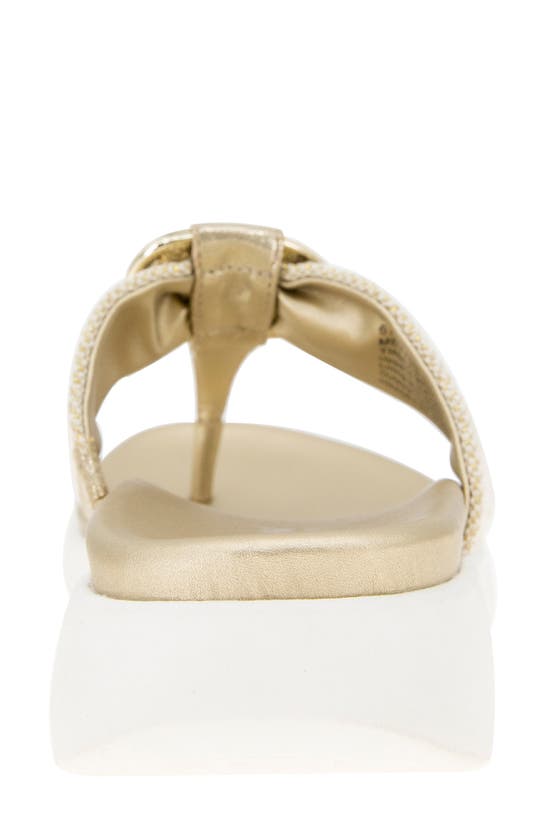 Shop Reaction Kenneth Cole Tina Thong Sandal In Soft Gold Canvas