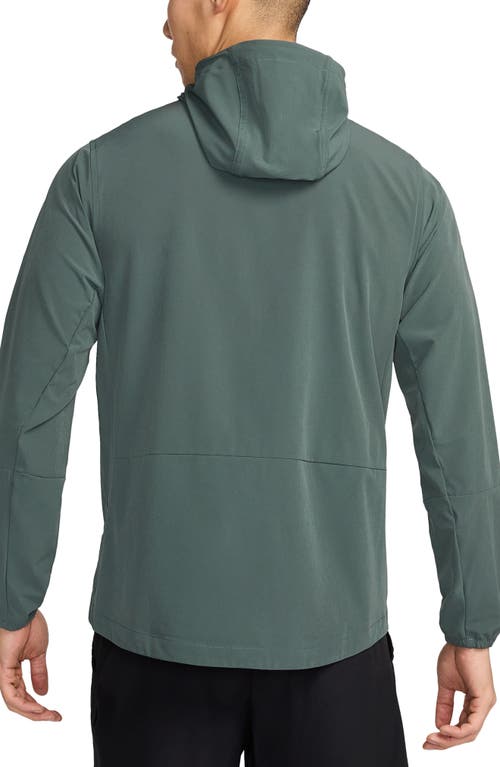 Shop Nike Repel Unlimited Dri-fit Hooded Jacket In Vintage Green/black