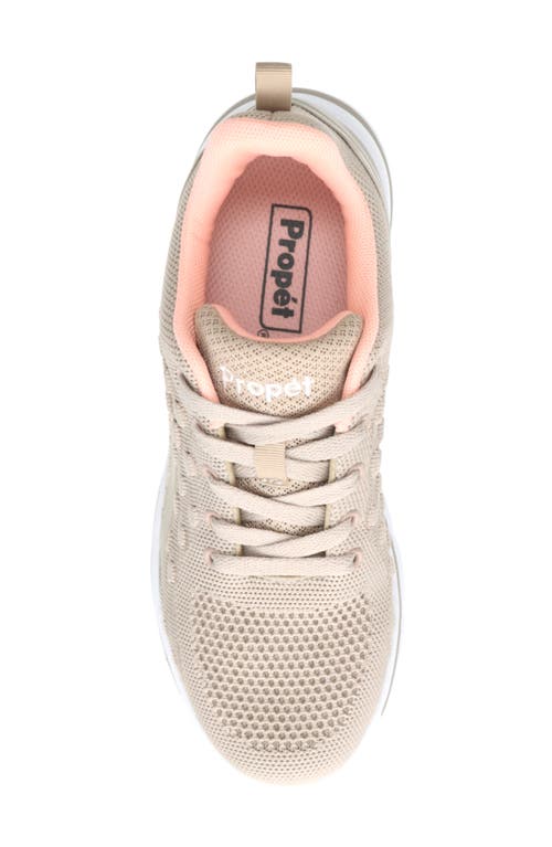 Shop Propét Travelactiv Axial Lace-up Sneaker In Taupe/peach Fabric