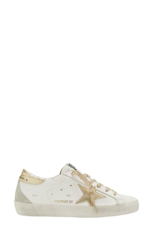 Shop Golden Goose Super-star Low Top Sneaker In White/gold