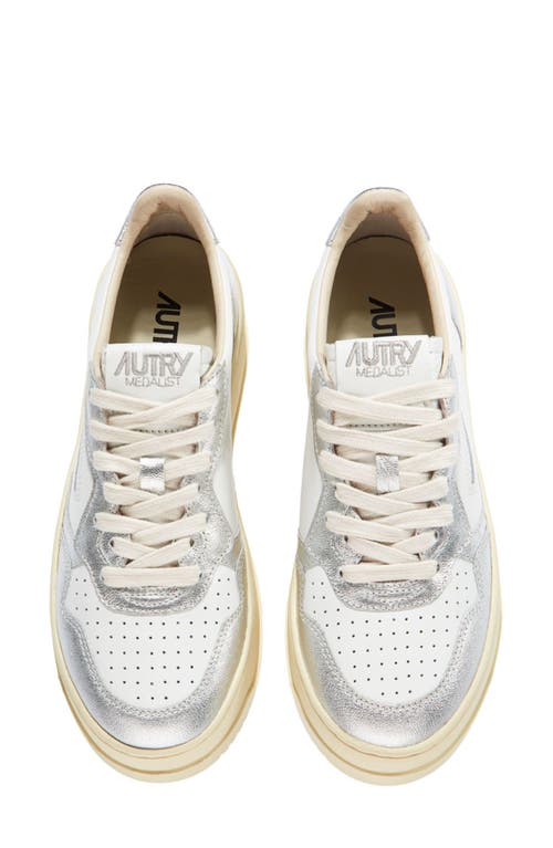 Shop Autry Platform Sneaker In White/silver