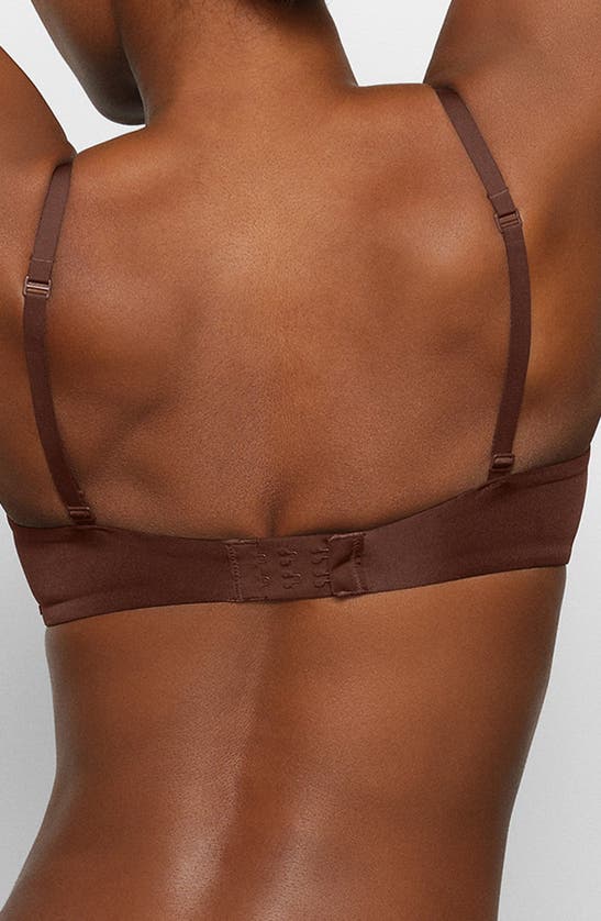 Shop Skims Wireless Form Push-up Plunge Bra In Cocoa