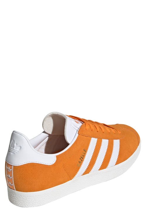 Shop Adidas Originals Adidas Gazelle Sneaker In Orange/white/white