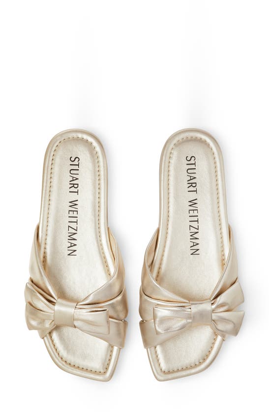 Shop Stuart Weitzman Sofia Bow Slide Sandal In Light Gold