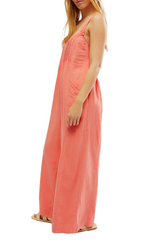 Shop Free People Drifting Dreams Linen Blend Jumpsuit In Radiant Watermelon