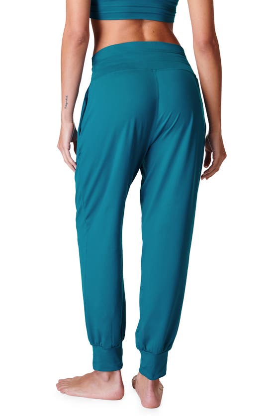 Shop Sweaty Betty Gaia Pocket Joggers In Reef Teal Blue