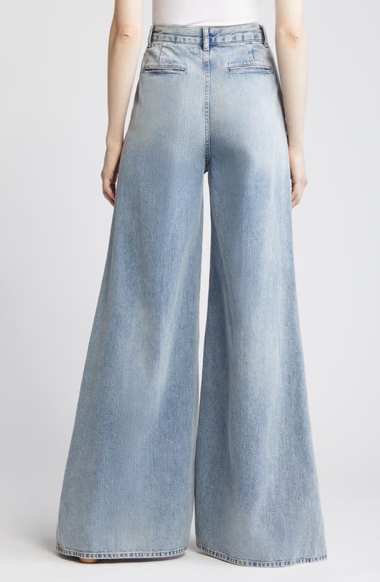 Shop Frame The Extra Wide Leg Jeans In Seraphina