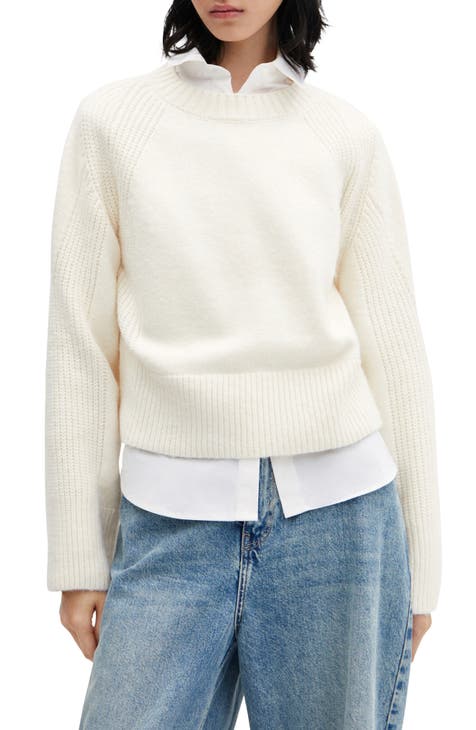 Sweater with outlet buttons on sleeves