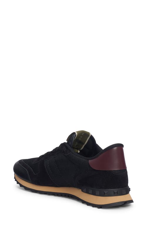 Shop Valentino Garavani Rockrunner Sneaker In Nero/nero-nero/nero-rubin