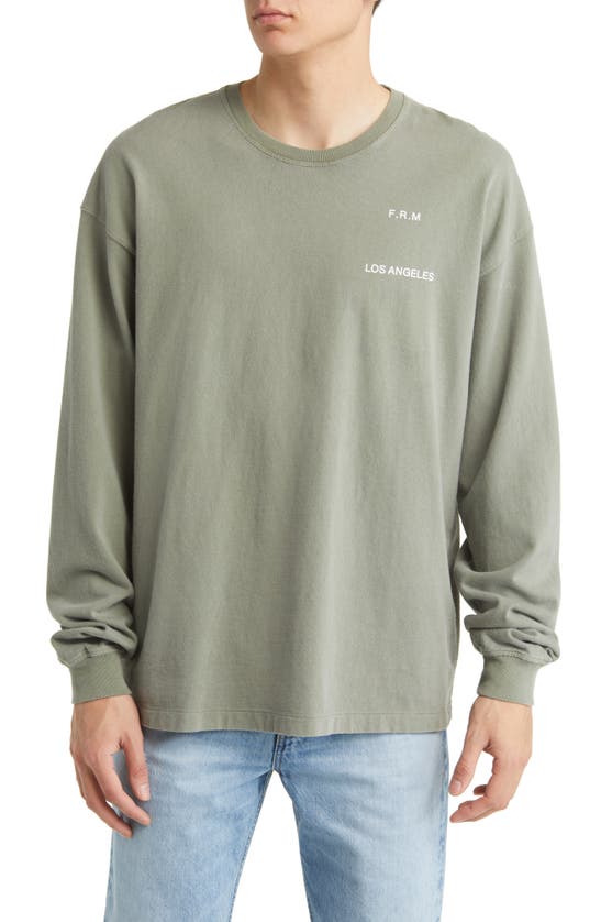 Frame Faded Washed Long Sleeve Graphic Tee In Green