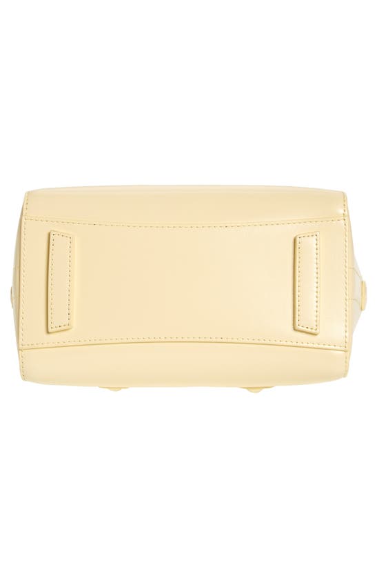 Shop Givenchy Mini Antigona Lock Leather Satchel In Soft Yellow